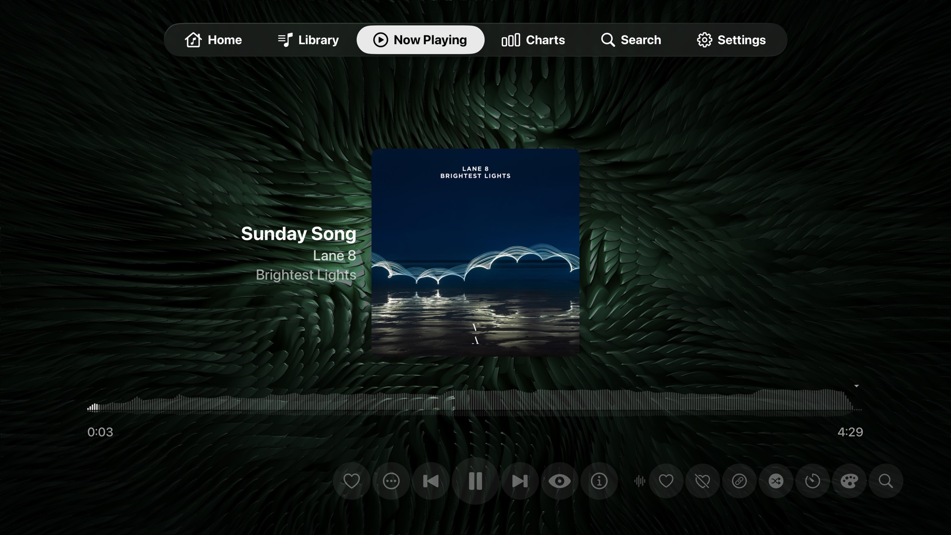 Now Playing with a MilkDrop visualizer running behind the album art
